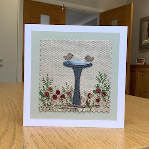 Sewn fabric, bird bath, sparrows, garden scene textile art, appliqué greetings card.