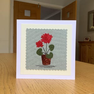Sewn fabric, Geraniums, summer flowers. Handmade textile art greetings card.