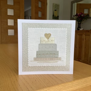 Wedding cake, sewn fabric, textile art, free motion embroidered celebration card.