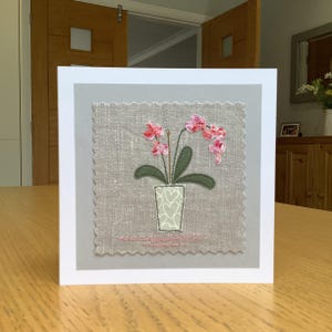 Sewn fabric flowering Orchid, handmade textile art greetings card.