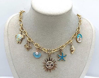 Charm Necklace - Stainless Steel - Sun, Starfish, Seashell, Seahorse - Trendy Blue and Gold Gift - Birthday/Christmas Gift