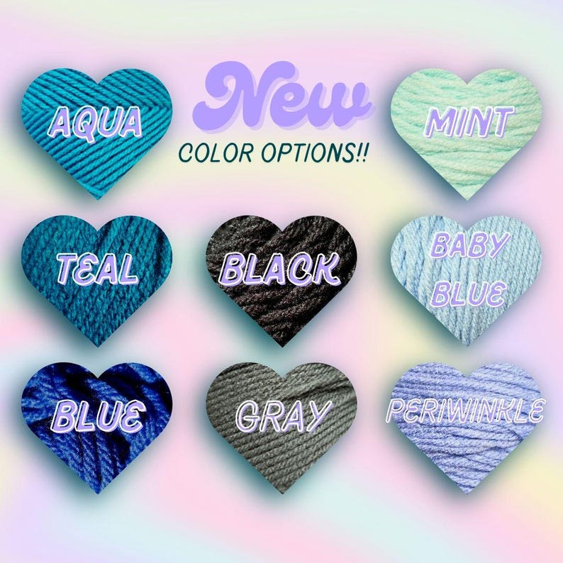 May include: Image showcasing nine heart-shaped yarn samples in various colors: aqua, mint, teal, black, baby blue, blue, gray, and periwinkle. The text "New COLOR OPTIONS!!" is displayed above the hearts, indicating new color choices.