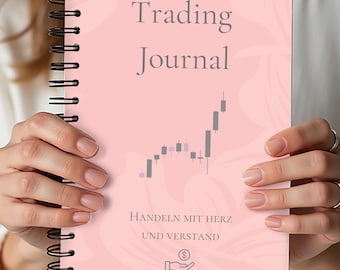 May include: A pink spiral-bound notebook titled "Trading Journal" with gray text and a stock chart graphic. The cover also includes the text "HANDELN MIT HERZ UND VERSTAND" and a hand with a dollar sign.