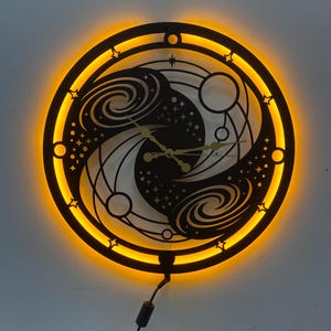 Galaxy Metal Wall Clock with LED Light, Cosmic Wall Decor, Illuminated Space Theme Clock, Hands of Time Art, Modern Steel Wall Clock