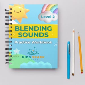 May include: A blue and yellow workbook with the title "Blending Sounds" and the subtitle "Practice Workbook". The cover features a cartoon sun, a rainbow, and the text "Level 2". The book is from Kids Spark House.