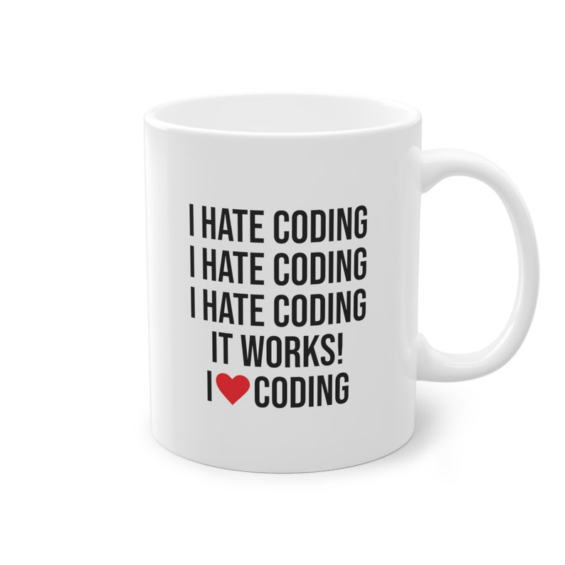 0.33L mug featuring the witty phrase "I hate coding, it works, I love coding"