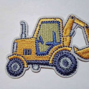 Könnte beinhalten: Gelber gestickter Bügelaufkleber mit einer Cartoon-Bagger mit blauen Details.