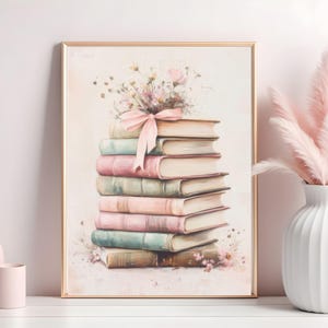 May include: A stack of vintage books with a pink ribbon tied around them. The books are decorated with delicate floral illustrations and are arranged on a light pink background.