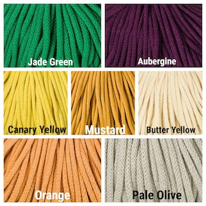 May include: A collection of seven braided cords in various colors labeled as Jade Green, Aubergine, Canary Yellow, Mustard, Butter Yellow, Orange, and Pale Olive. Each section displays the textured, woven surface of the individual cord strands.