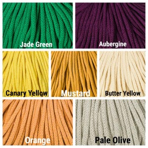 May include: A collection of seven braided cords in various colors labeled as Jade Green, Aubergine, Canary Yellow, Mustard, Butter Yellow, Orange, and Pale Olive. Each section displays the textured, woven surface of the individual cord strands.