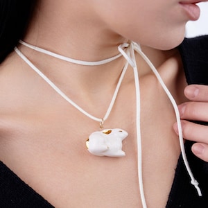 3d ceramic white gold bunny pendant. Spirit animal totem clay charm necklace glass.  Bohemian jewelry. Vegan boho hippie style. Handmade.