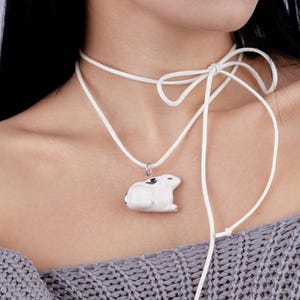 3d ceramic white silver bunny pendant. Spirit animal totem clay charm necklace glass.  Bohemian jewelry. Vegan boho hippie style. Handmade.