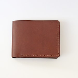 Cartera bi-fold de cuero italiano hecha a mano
