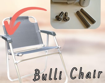 May include: A gray folding chair with a metal frame and a gray fabric seat. The chair is on a sandy beach. The image also shows replacement parts for the chair, including two metal brackets, two screws, and two metal pins. The text "Bulli Chair Repair" is visible in the image.