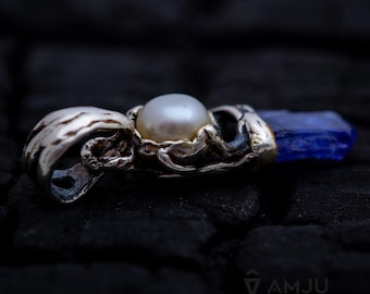 Raw Tanzanite crystal with freshwater pearl, pendant