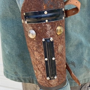 Metal bracer made from rusty steel Post apoc style