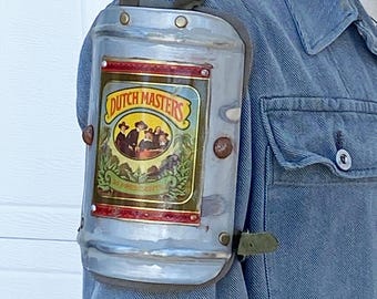 Formed aluminum shoulder armor piece with can graphics