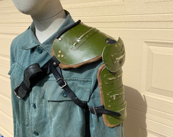 Post Apocalyptic style shoulder armor with "damage"