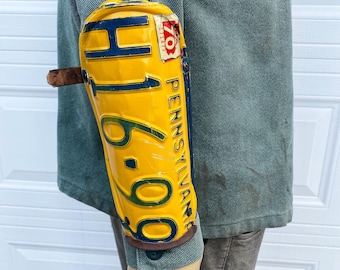 Bracer made from license plate