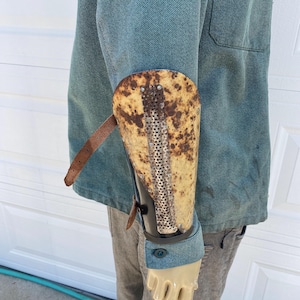 Metal bracer made from rusty steel Post apoc style