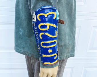 Bracer made from license plate