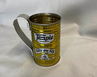 Tin cup made from food can, dried peas