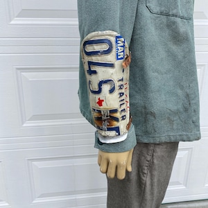 Bracer made from license plate