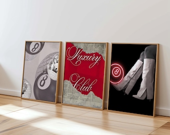May include: Three framed art prints. The first features a gray background with a disco ball and an eight ball. The second has the words "Luxury Club" over a red background. The third shows white boots and a neon eight ball.