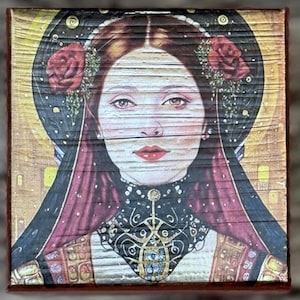 May include: Square wooden art piece featuring a woman's portrait. The woman has red lips, and is adorned with red roses and a decorative collar. The background has a golden halo and a dark night sky. The artwork has a vintage, antique aesthetic.