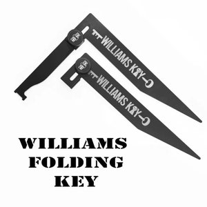Könnte beinhalten: Zwei schwarze Klappschlüssel mit dem Aufdruck "Williams Key". Die Schlüssel sind aus Metall und haben eine schwarze Oberfläche.