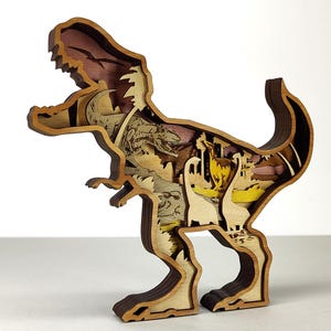 May include: A multi-layered wooden Tyrannosaurus Rex sculpture. The dinosaur is brown with lighter wood tones inside, depicting a prehistoric landscape with other dinosaurs. The sculpture is a unique decorative item.