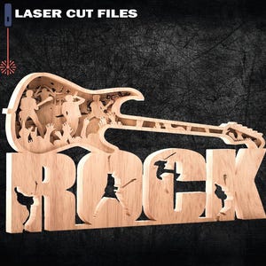 May include: Wooden laser-cut wall art shaped like a guitar, with the word "ROCK" in large letters. The guitar design features a crowd at a concert. The text "LASER CUT FILES" is at the top.