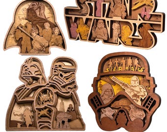 May include: Set of 4 laser-cut wooden Star Wars themed wall art pieces. Each piece features a different design, including Darth Vader, Stormtroopers, and iconic characters. The text "LASER CUT FILES" and "SET OF 4" are visible.