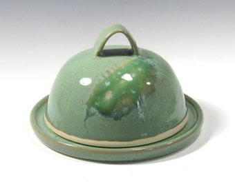garlic roaster, lidded butter or cheese dish, kitchen accessory