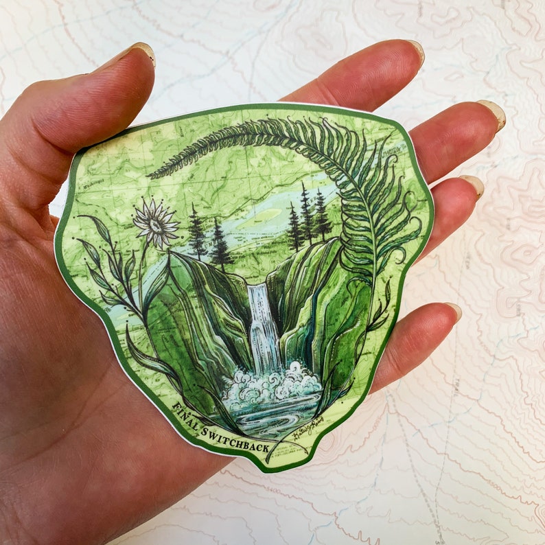 May include: A green and white sticker with a watercolor illustration of a waterfall in a forest. The sticker has the text "Final Switchback" at the bottom.