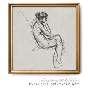 May include: A black and white line drawing of a person sitting in a chair. The drawing is in a gold frame.