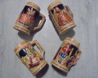 Set of 4 Vintage Relief Ceramic Beer Steins | Decorative European Mugs | Collectible Barware