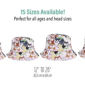 May include: Three different sizes of white bucket hats with a colorful cartoon dog print. The hats are available in 15 sizes from 12 inches to 26 inches, or 30.5 centimeters to 66 centimeters.