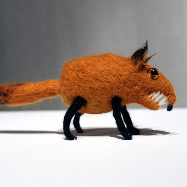 Needle felted fox with sharp monster teeth