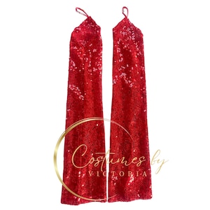 Può includere: Un paio di maniche lunghe in paillettes rosse con spalline regolabili. Le maniche sono realizzate in un tessuto scintillante e sono perfette per aggiungere un tocco di glamour a qualsiasi outfit.
