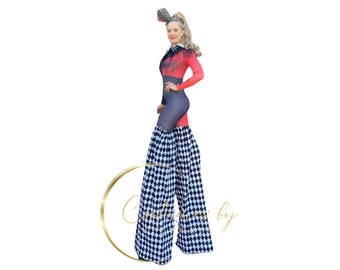 May include: A woman wearing a red and black costume with a black and white checkered pattern on her pants. She is standing on stilts.