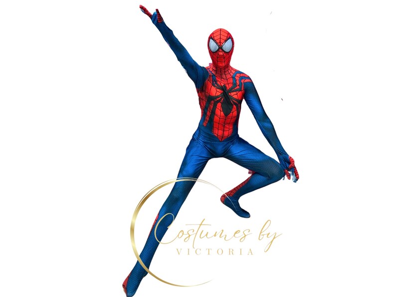 May include: A person wearing a red and blue Spiderman costume with a black spider design on the chest. The person is in mid-air with one arm raised and the other arm bent at the elbow. The person is wearing a red mask with black eyes.
