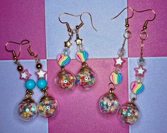 Pendientes colgantes con bolas de purpurina
