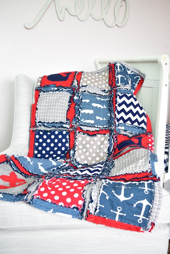 red and grey nursery bedding
