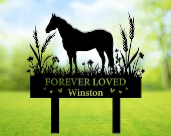 May include: Black metal silhouette of a horse standing in a field of flowers with the words "Forever Loved Winston" on a sign below.