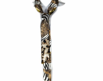 Cravatta con stampa animalier Cravatta con stampa animalier Cravatta da donna Cravatta con stampa zebrata Cravatta con stampa leopardata Cravatta in raso da donna Cravatta sottile in raso Cravatta Zoom da donna