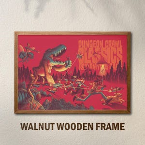 May include: A framed print with a red background and a fantasy illustration. The artwork features a dinosaur, figures, and the text "DUNGEON CRAWL CLASSICS ROLE PLAYING GAME." The frame is made of walnut wood.
