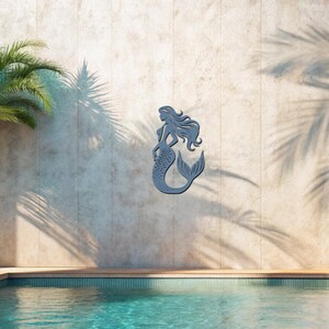 metal mermaid,
beach wall art,
coastal wall art,
mermaid art,
mermaid wall art,
ocean wall art,
nautical wall art,
outdoor wall art,
pool wall decor,
seaside wall art, 
bathroom metal art,
garden art,
sea life art,