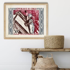 May include: A vintage postage stamp from the Republic of the Congo featuring a red and blue design. The stamp depicts people working in a textile factory. The stamp reads "REPUBLIQUE DU CONGO" and "COMPLEXE TEXTILE DE KINSOUNSI. SOTEXCO".