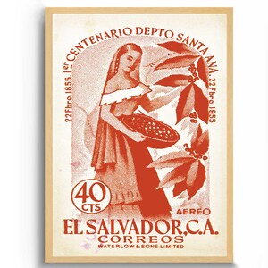 May include: Vintage El Salvador poster in a wooden frame. The poster features a woman holding a bowl of coffee beans, with text that reads "EL SALVADOR, C.A. CORREOS" and "WATERLOW & SONS LIMITED". The poster is in shades of red and cream.